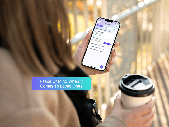 A woman using the pocketcarer app whilst holding a coffee